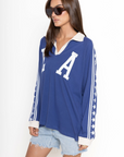 Raglan Rugby Long Sleeve
Featuring a shoutout to Los Angeles across the chest
Star detailed sleeves
Oversized fit
Collar and placket
Blue LA long sleeve top
Dodgers top