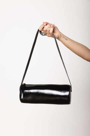 black Barrel shoulder purse
Cylindrical silhouette shoulder bag
Versatile strap - over the shoulder or crossbody
Adjustable Shoulder Strap
Zip closure
Vegan Leather