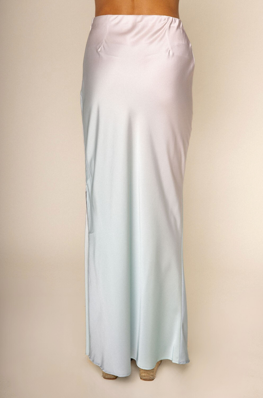 Blush ombre maxi skirt
Side slit
Elastic waistband
Side zipper closure
Unlined
pink and blue ombre maxi skirt