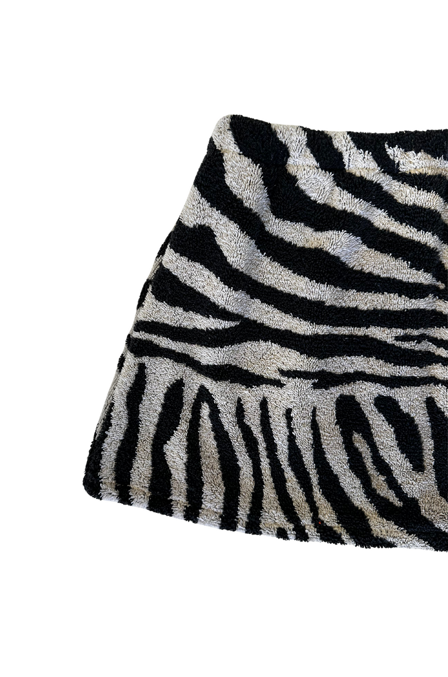 Zebra printed towel skirt
Elastic waistband
Unlined
Up-cycled
Each towel is up-cycled - there may be imperfections