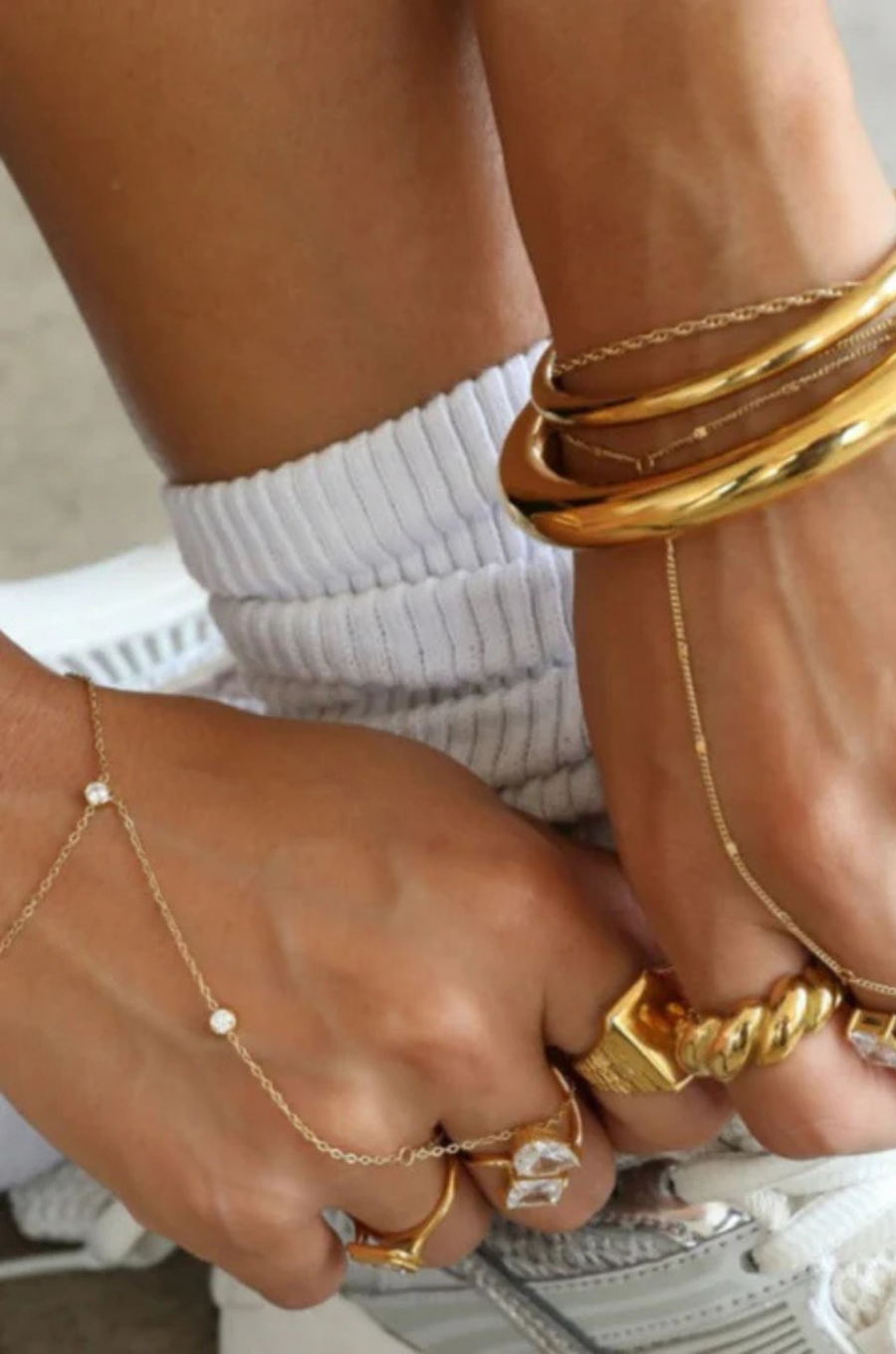 Two bezel-set cubic zirconia stones hand chain
This ultra-sleek, tarnish-free hand chain is crafted from premium stainless steel and designed to keep its shine through every hand wash and pump of sanitizer.
Just the right amount of sparkle, catching the light with your every move.
Lightweight yet bold, it layers effortlessly or stuns solo with a clean, minimalist edge.
Wear it. Wash your hands. Repeat. This is your new everyday flex.
Gold hand chain