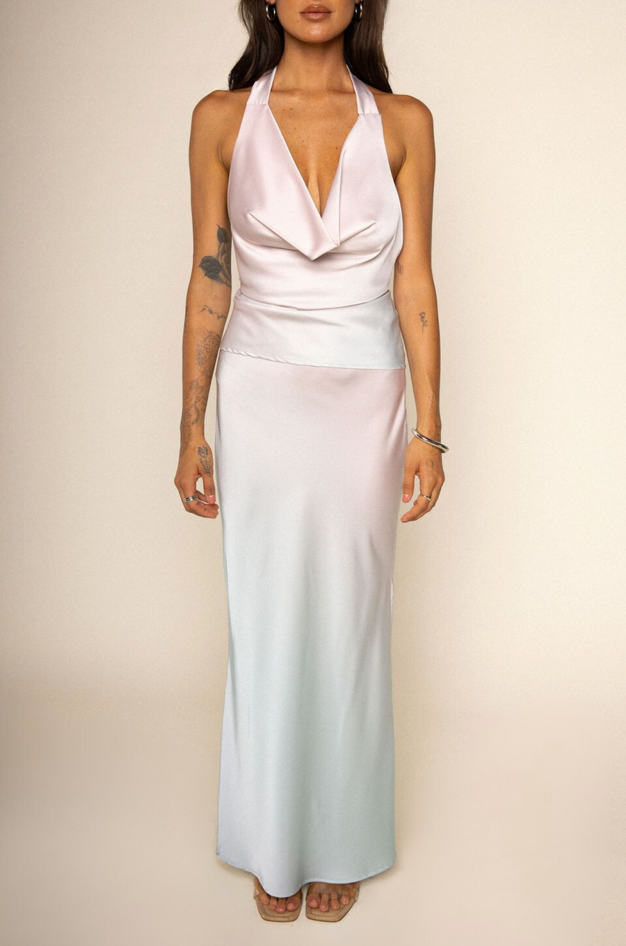Blush ombre maxi skirt
Side slit
Elastic waistband
Side zipper closure
Unlined
pink and blue ombre maxi skirt