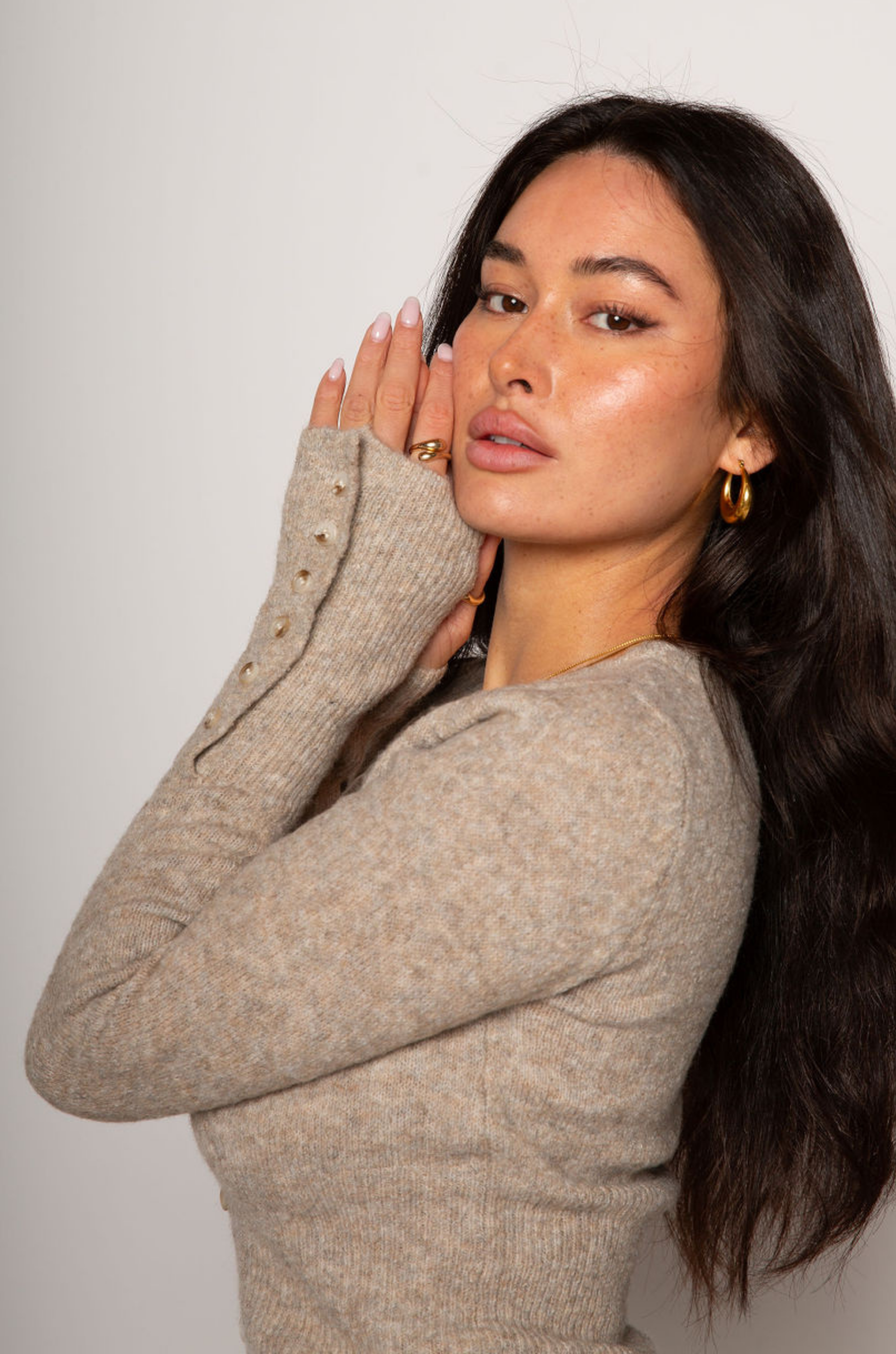 Fuzzy marled crochet knit cropped cardigan. Front button down closure. Long sleeves. Unlined. Fuzzy marled crochet knit skirt. Elastic folded waistband. Unlined. fuzzy skirt and top set. fall set. fall skirt set.