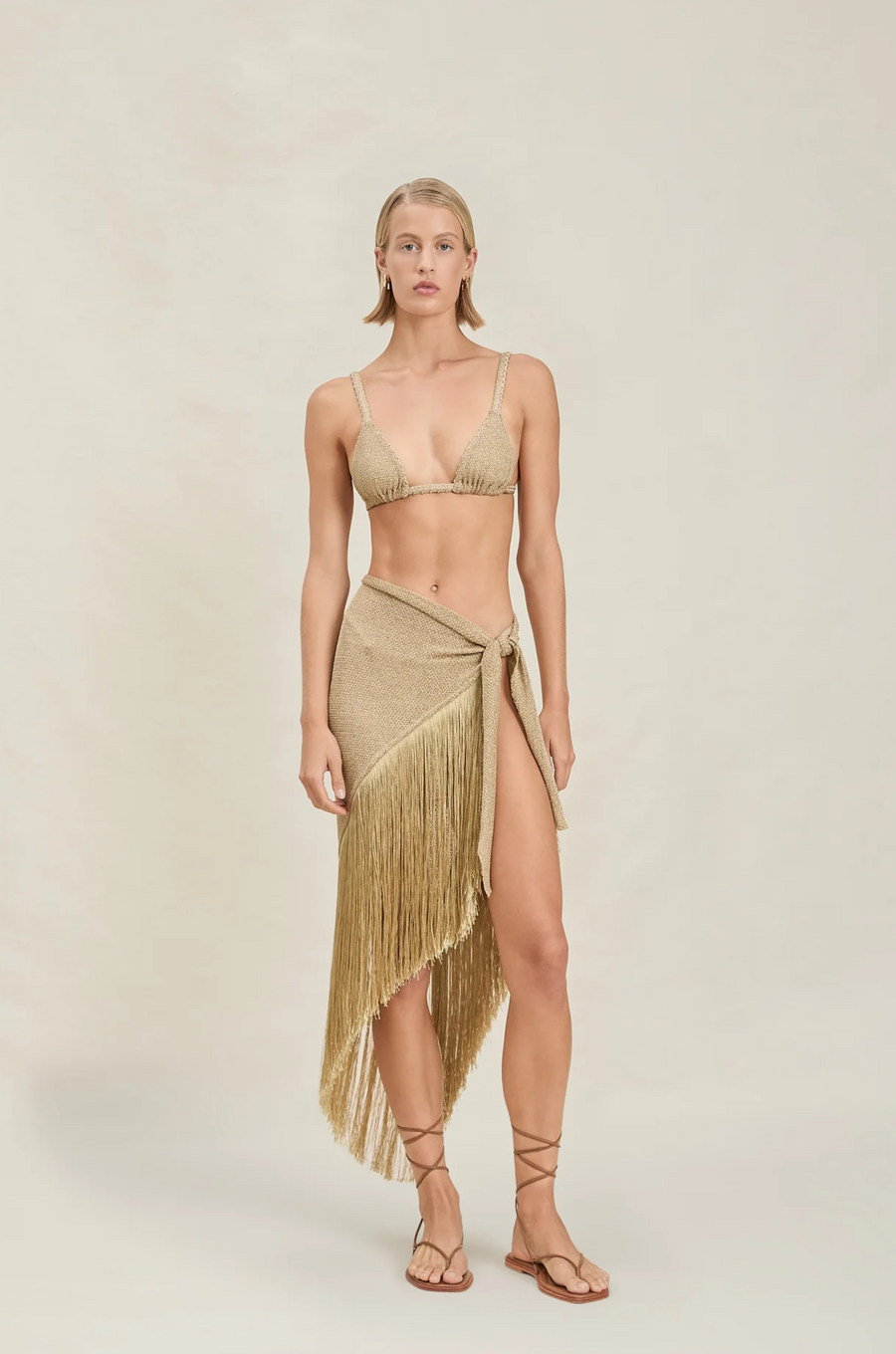 Shimmer metallic sarong skirt
Fringe detailing at hem
Can also convert into a top
gold shimmer cover up skirt
gold sarong