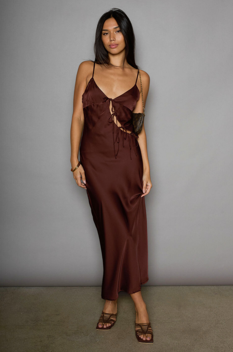 Satin maxi dress. Adjustable straps. Front tie closures. Side hook and eye and zipper closures. Unlined. brown satin midi dress. brown maxi satin dress. fall dress. fall wedding guest dress