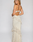 Polka dot printed maxi dress
Tube top
Ruffle on bust trim
Asymmetric ruffle detail on bottom half
Back cut out
Inner rubber grip lining
Side zipper closure
Lined
cream and black polka dot dress
bridal maxi dress