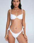 white Eyelet bikini bottoms
Adjustable tie sides
Crafted from premium Cotton Poplin Eyelet
100% Cotton
Runs small
Soft & delicate fabric, wear with care