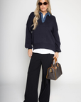 blue Oversized knit sweater
Denim collar
1/4 button closure
Unlined
Length: 26"
Cotton/Acrylic
fall sweater
fall outfit