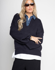 blue Oversized knit sweater
Denim collar
1/4 button closure
Unlined
Length: 26"
Cotton/Acrylic
fall sweater
fall outfit