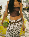 Tiger printed maxi skirt
Crafted from airy bamboo twill
Bias-cut silhouette creates a beautiful fluid drape and playful, bouncy movement
Fit runs true to size