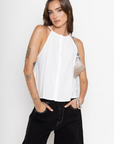 white Linen high neck tank top
A line
Button down closure
Fixed straps
Unlined