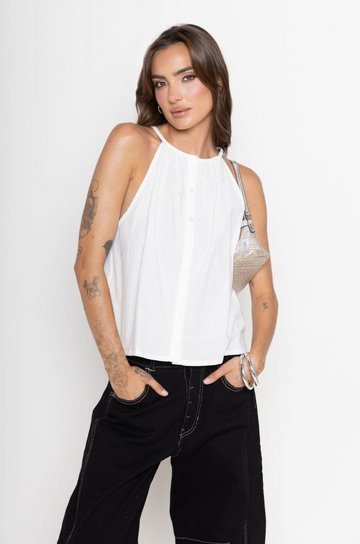 white Linen high neck tank top
A line
Button down closure
Fixed straps
Unlined