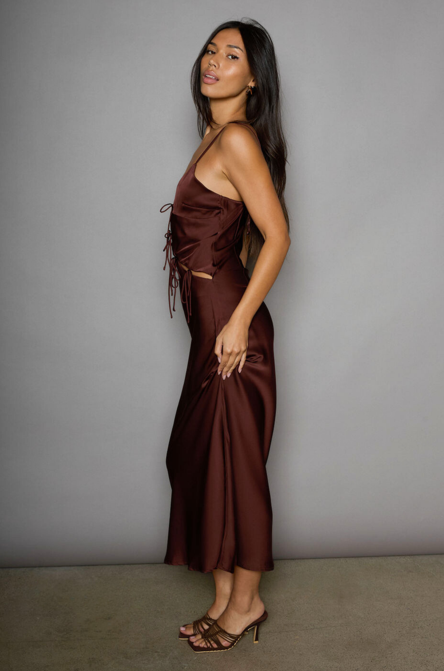 Satin maxi dress. Adjustable straps. Front tie closures. Side hook and eye and zipper closures. Unlined. brown satin midi dress. brown maxi satin dress. fall dress. fall wedding guest dress
