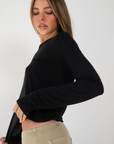 black Knit long sleeve tee
Crewneck
Unlined
Length: 21.5"
Rayon/Acrylic/Spandex