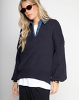 blue Oversized knit sweater
Denim collar
1/4 button closure
Unlined
Length: 26"
Cotton/Acrylic
fall sweater
fall outfit