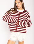 Striped cardigan
Long sleeve
Button down closure
Crew neckline
Unlined
burgundy ivory striped cardigan
christmas sweater
christmas outfit