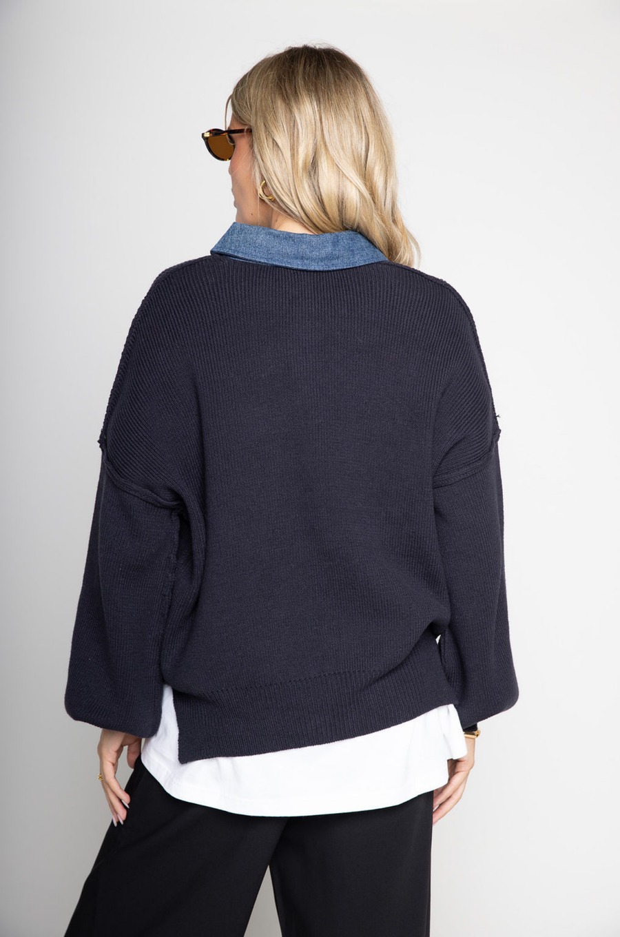 blue Oversized knit sweater
Denim collar
1/4 button closure
Unlined
Length: 26"
Cotton/Acrylic
fall sweater
fall outfit