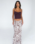 Tiger printed maxi skirt
Crafted from airy bamboo twill
Bias-cut silhouette creates a beautiful fluid drape and playful, bouncy movement
Fit runs true to size