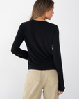 black Knit long sleeve tee
Crewneck
Unlined
Length: 21.5"
Rayon/Acrylic/Spandex