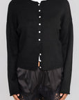 black Knit long sleeve cardigan
Rolled collar
Button down closure
Unlined
black cardgian