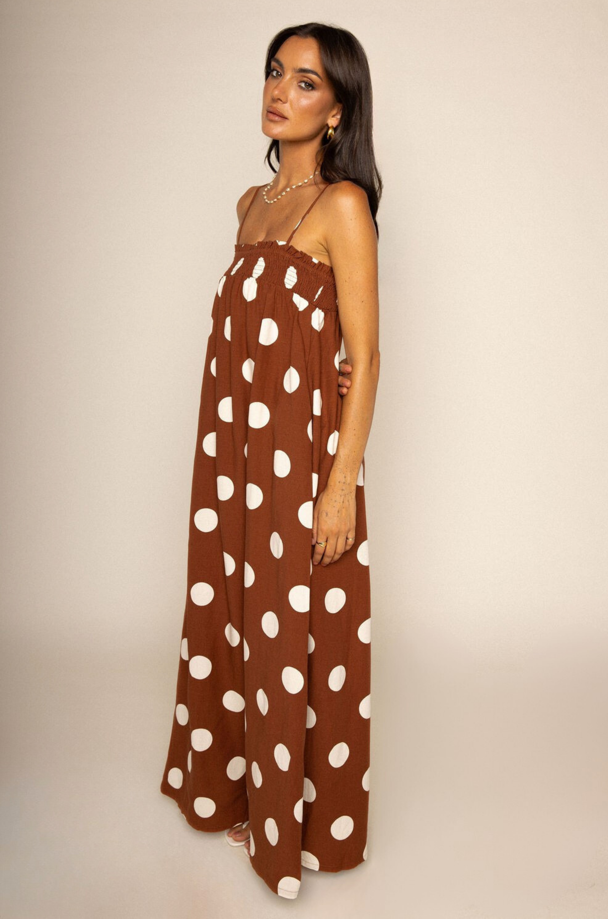 Linen polka dot maxi dress
Side pockets
Adjustable straps
Smocked bust hem
Unlined
brown and white polka dot maxi dress