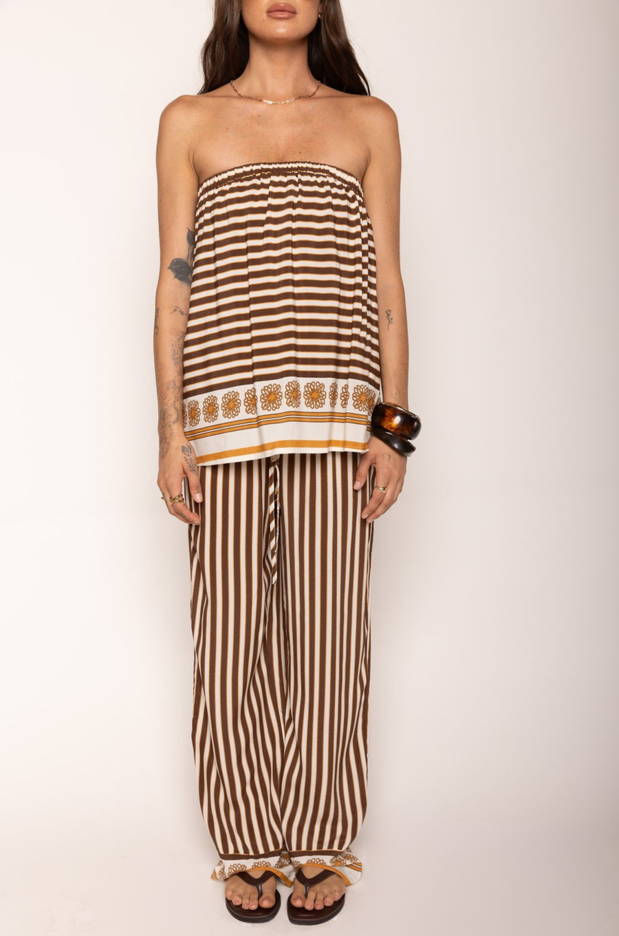 Striped tube top
Elastic band
Unlined
cream and brown striped tube top
resort wear top
swim cover up top