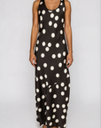 Satin polka dot maxi dress
Scoop neckine
Strapless
Side zipper closure
Unlined
Black and white polka dot maxi dress