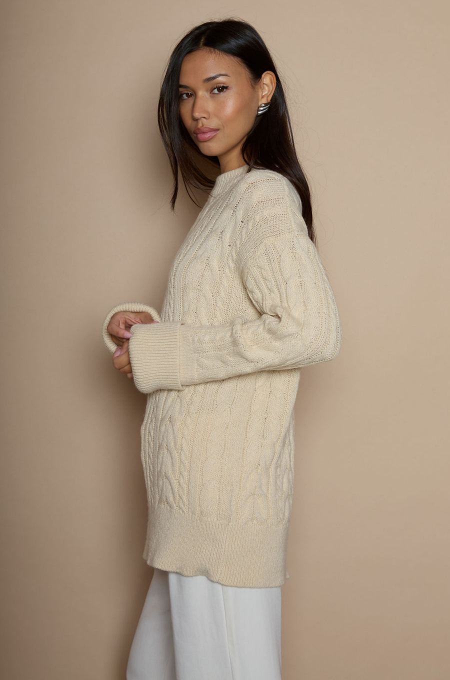Cable knit sweater dress. Crewneck. Long cuffed sleeves. Unlined. beige sweater dress. fall sweater dress. holiday look