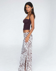 Tiger printed maxi skirt
Crafted from airy bamboo twill
Bias-cut silhouette creates a beautiful fluid drape and playful, bouncy movement
Fit runs true to size