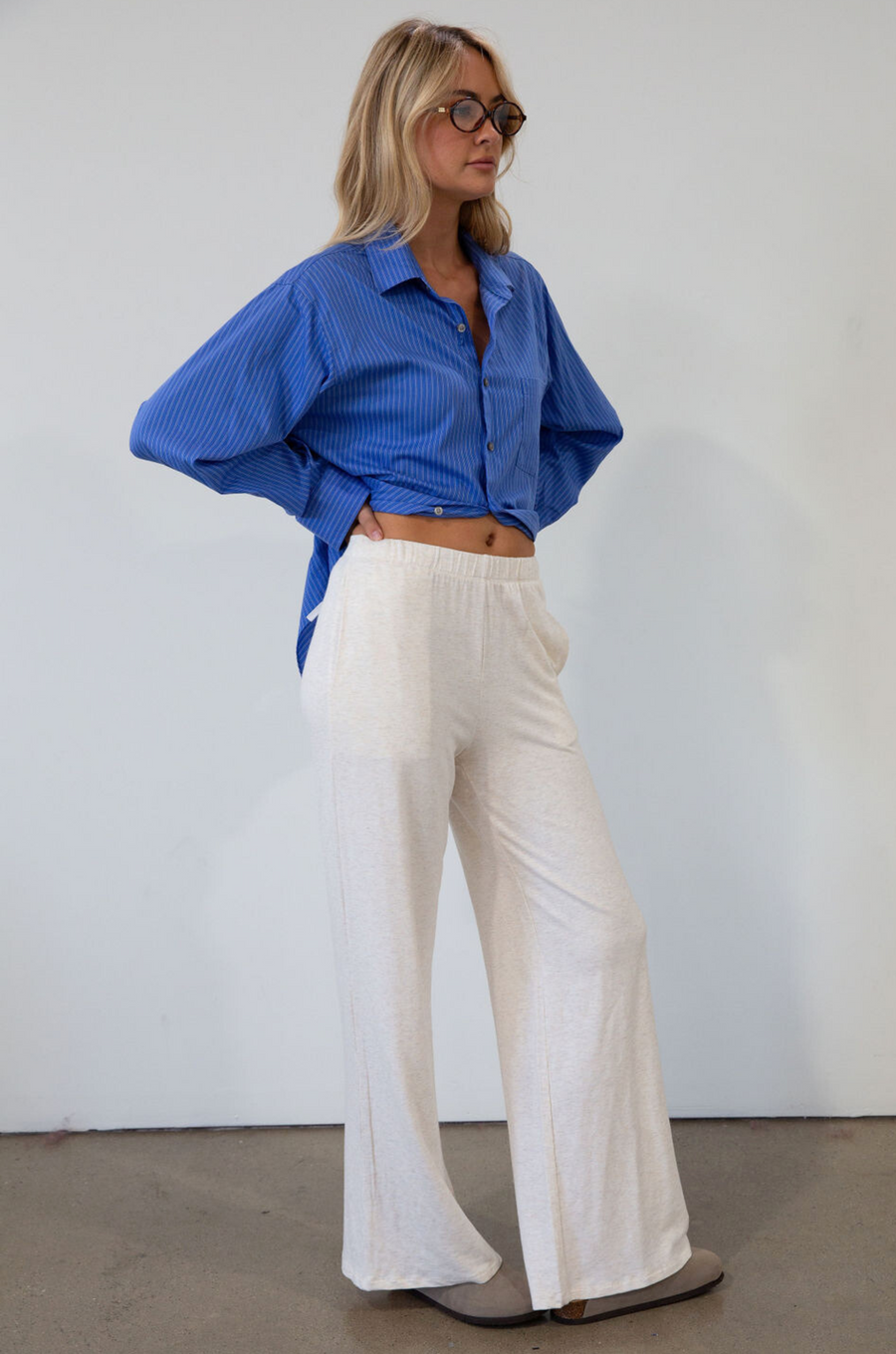 Ribbed knit pants. Elastic waistband. Side pockets. Unlined. causal pant. fall pant. cream casual pant