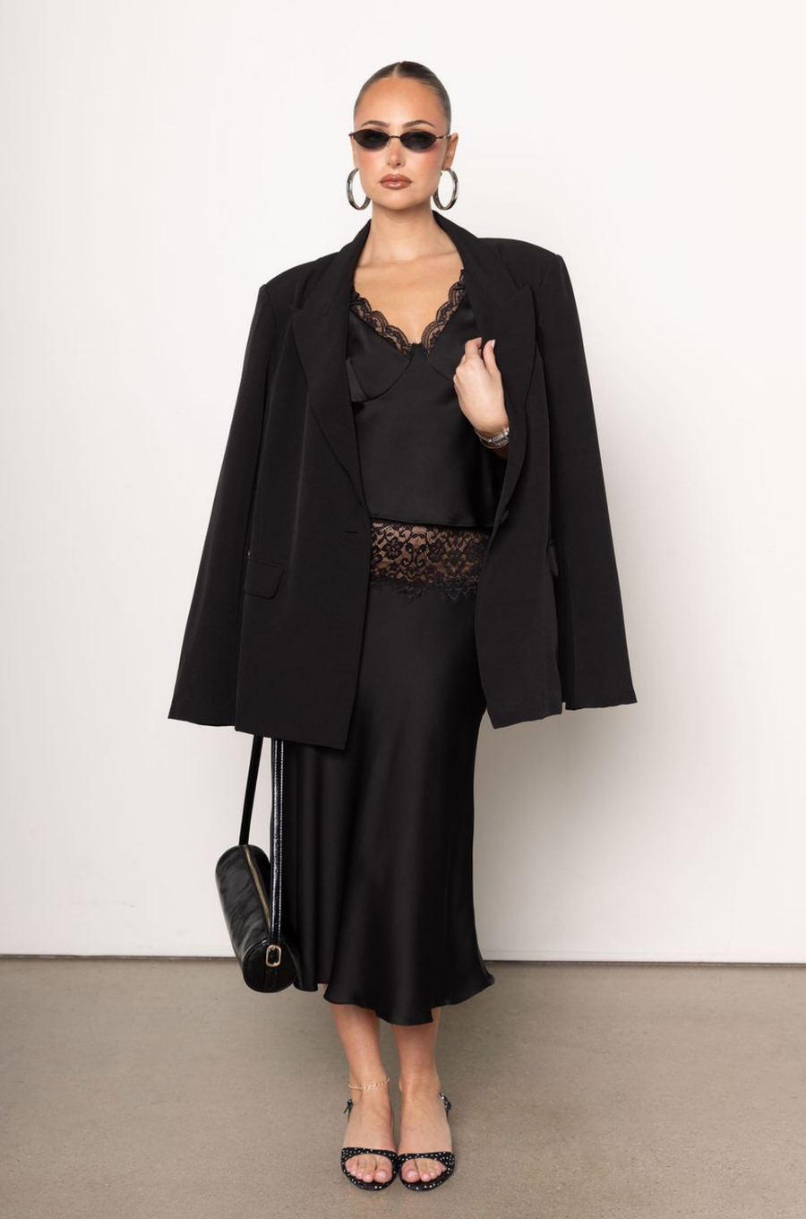 black Satin tank top
Lace trim and straps
V-neckline
Bow details
Unlined
fall top
fall tank top
fall outfit