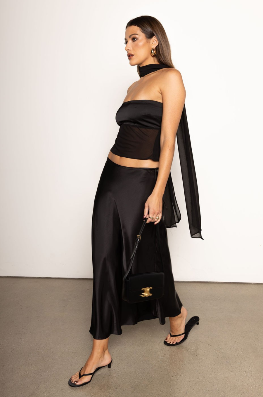 Satin maxi skirt
Bias cut
Adjustable waist tie
Side zipper closure
black satin maxi skirt
holiday outfit
holiday skirt
new years outfit