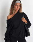 black Oversized hoodie sweatshirt
Fold over neckline
Front pocket
Unlined
can be worn multiple ways