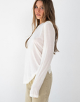 white Sheer long sleeve top
Crewneck
Unlined/Sheer
going out top