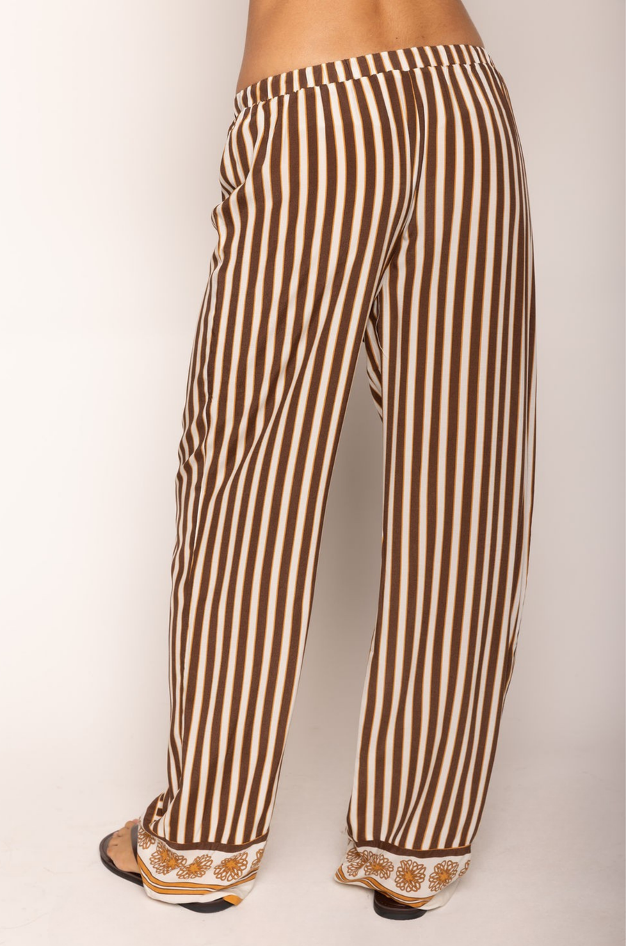 Striped pant
Adjustable drawstring waistband
Unlined
brown and cream striped pant
resort wear pant set
pant swim cover up