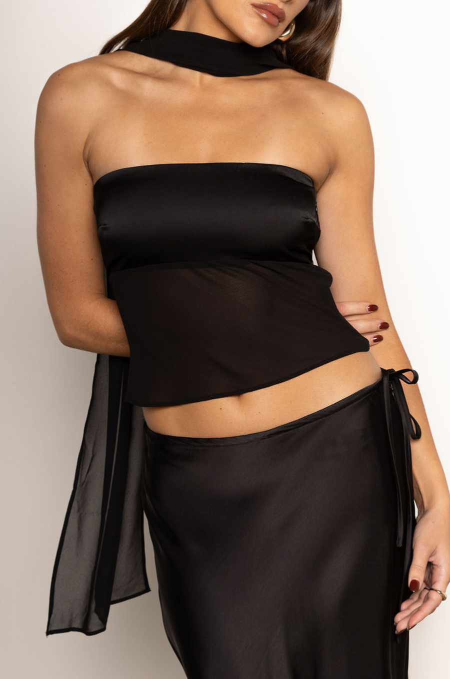 Satin tube top
Partial chiffon bodice
Comes with chiffon scarf
Strapless
Side zipper closure
black satin tube top
holiday outfit
new years top
new years outfit