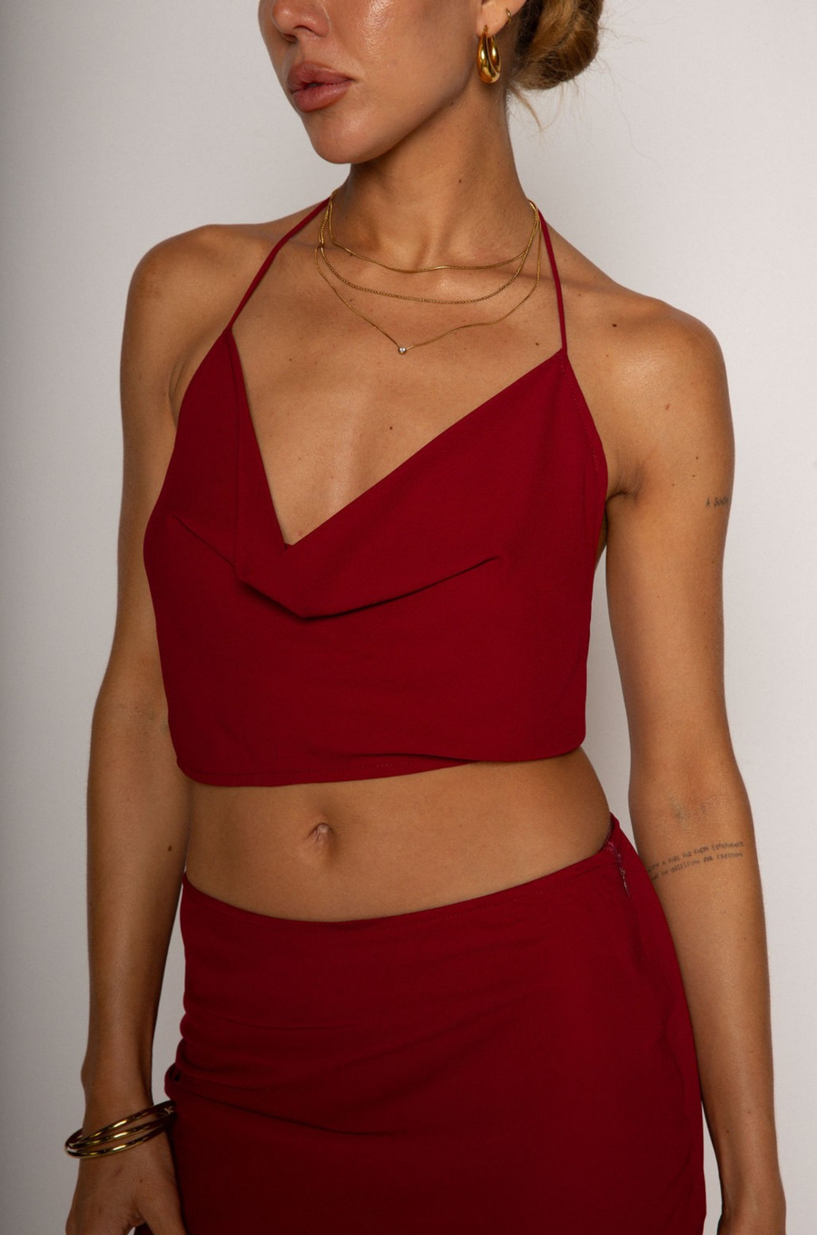 Halter crop top. Adjustable neck and back tie strap. Cowl neck. Partially lined. Maxi skirt. Hidden side zipper. Lined. red skirt set. cherry red skirt set. going out set. nice dinner set. summer outfit. spring outfit.