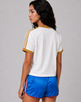 Modeled after a classic sports uniform
Raglan-sleeve jersey tee is fashioned from breathable cotton.
V-neck
Short raglan sleeves
Cotton