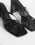 black Cross over strap heels
Squared toe
Block heel