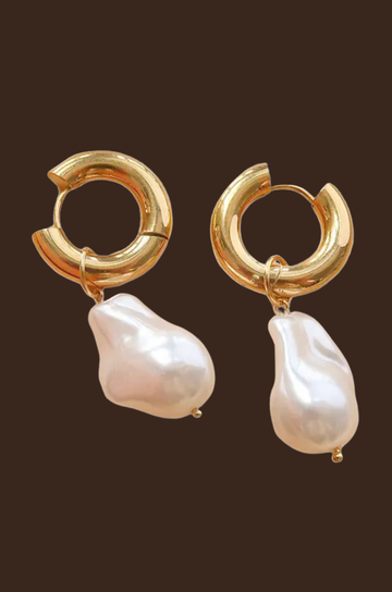 Small thick hoop earrings with pearl drop detail. Hinge closure.