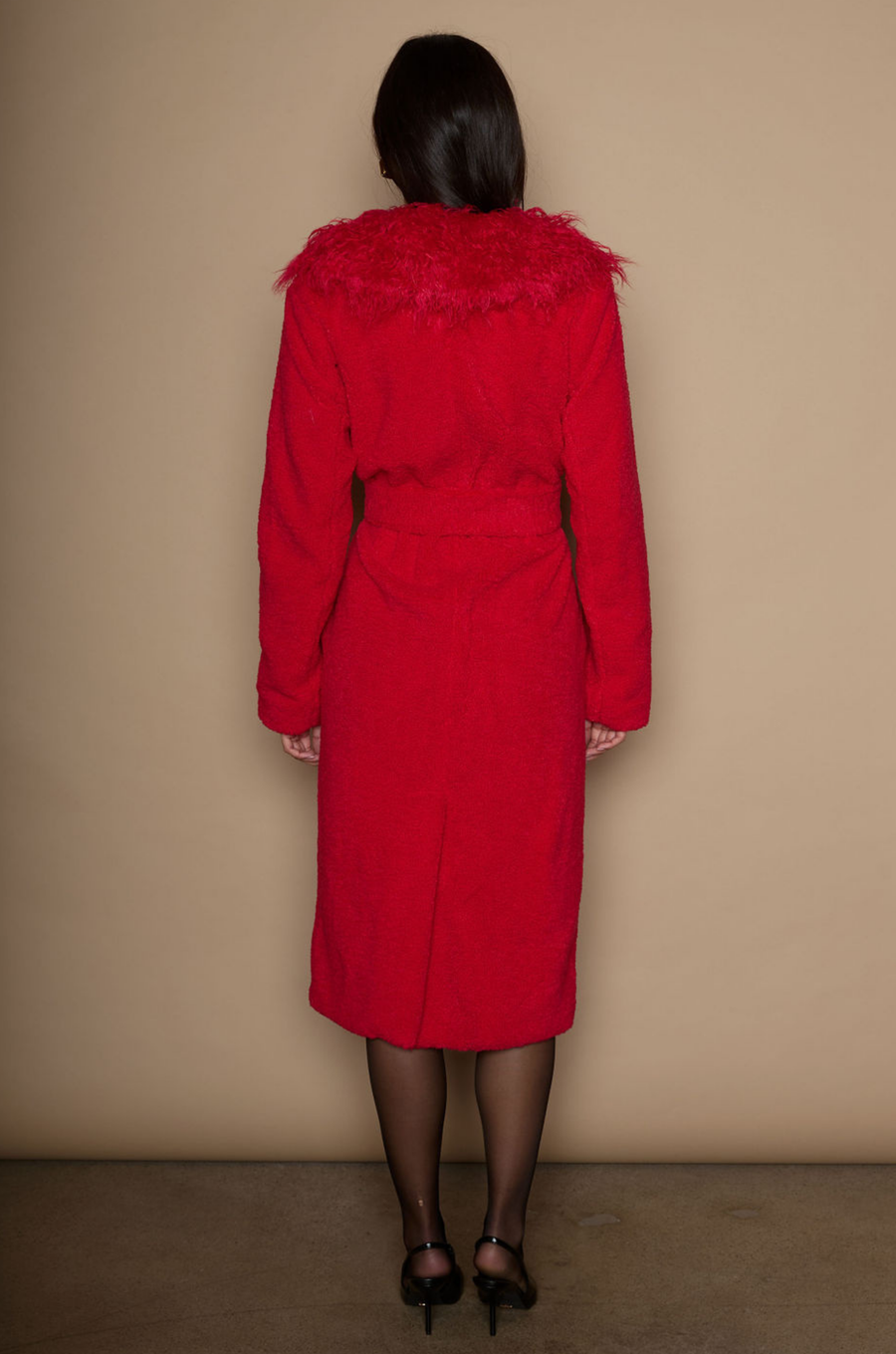 Faux sherpa longline coat. Faux fur collar neckline. Front snap button closure. Tie waist. Side pockets. Back slit. Fully lined. red fur coat. fall outfit. cute winter coat. trendy winter coat.