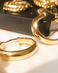 18K Non-Tarnish Classic Elongated Hoop Earring
18K Gold Plating
Stainless Steel