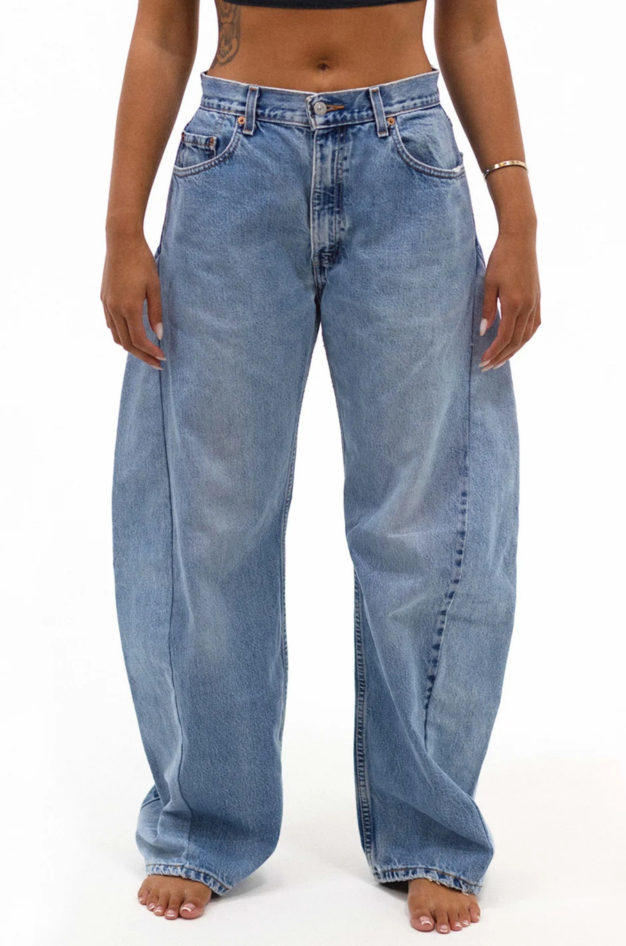 Our Barrel Customs are a mid to low rise jean
Baggy fit
Zip and fly closure
Please note, these pieces are vintage and have signs of wear. Some pieces have slight imperfections, which vary from piece to piece
Cotton
Light to medium wash levi jeans
Cutom barrel jeans
custom levi jeans
Ali grace jeans