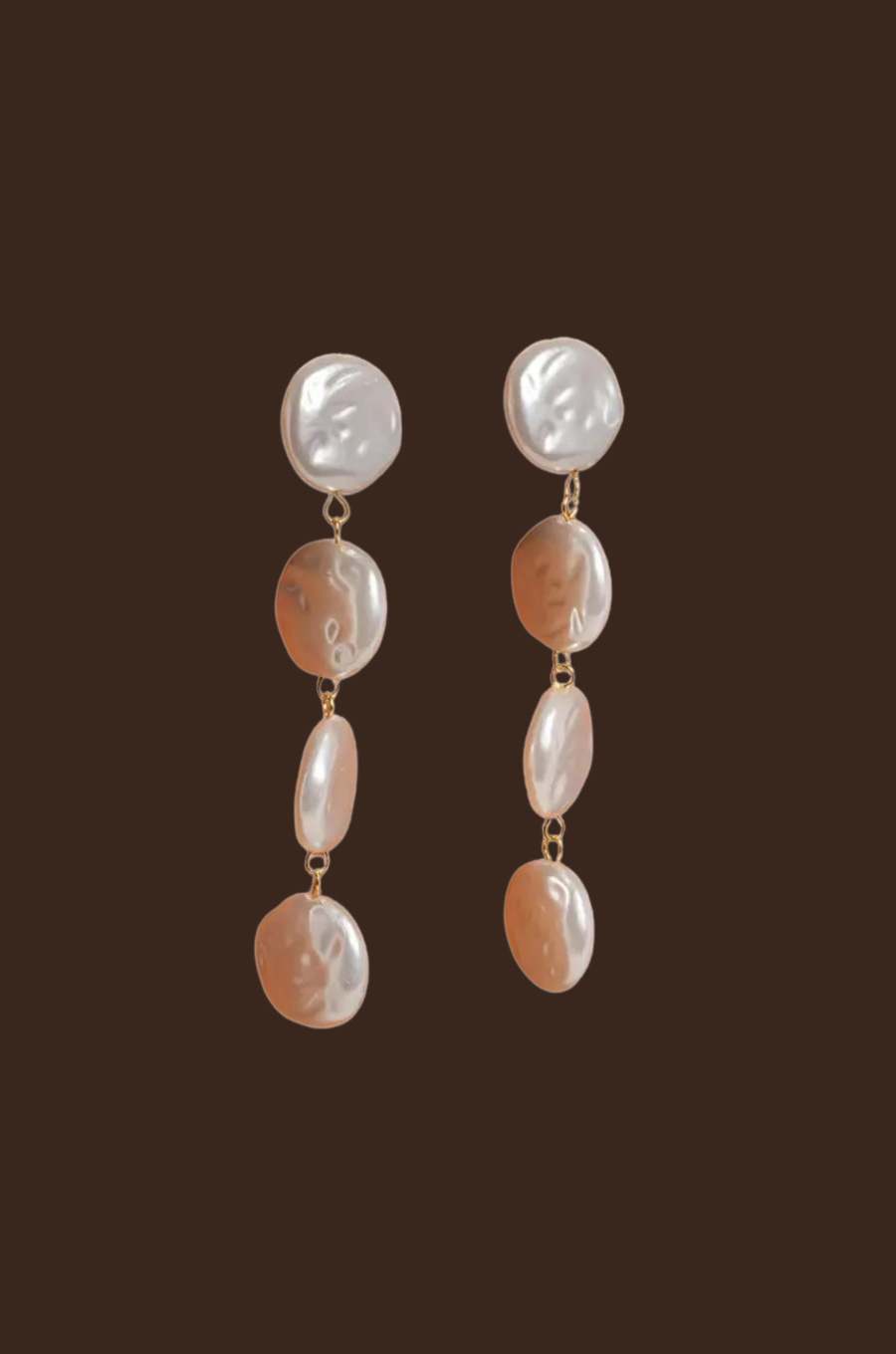 18K Non-Tarnish Pearl Drop Earring
18K Gold Plating Stainless Steel
Faux Pearl Measurement: 3.1inx0.63in
Lead and Nickel Free
Hypoallergenic
Water Resistant