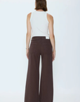 Mid-rise fit designed to sit lower on the hips for a relaxed, low-slung feel.
Full-length silhouette
32" inseam
Crafted from rigid denim, this style will naturally soften and relax over time.
brown denim jeans