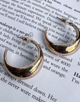 Open hoop gold earrings Post back.
