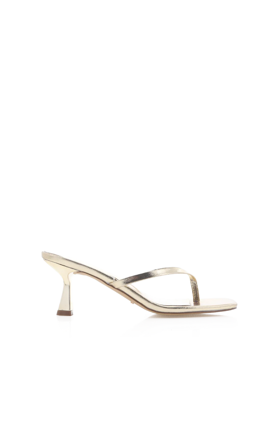 Xami is the perfect casual thong heel that will get you from work to the weekend. This on-trend style will be the perfect addition to your wardrobe.

low kicked-in stiletto heel
open square toe
thin thong toe straps
easy slip on design
open heel counter
synthetic upper, lining and outsole
Heel height: 2.56"
Synthetic
gold kitten heel
gold thong kitten keel
