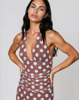 Polka dot maxi dress
Halter neckline
Adjustable neck tie
Ruched waist
V neckline
Partially lined
brown and blue polka dot maxi dress