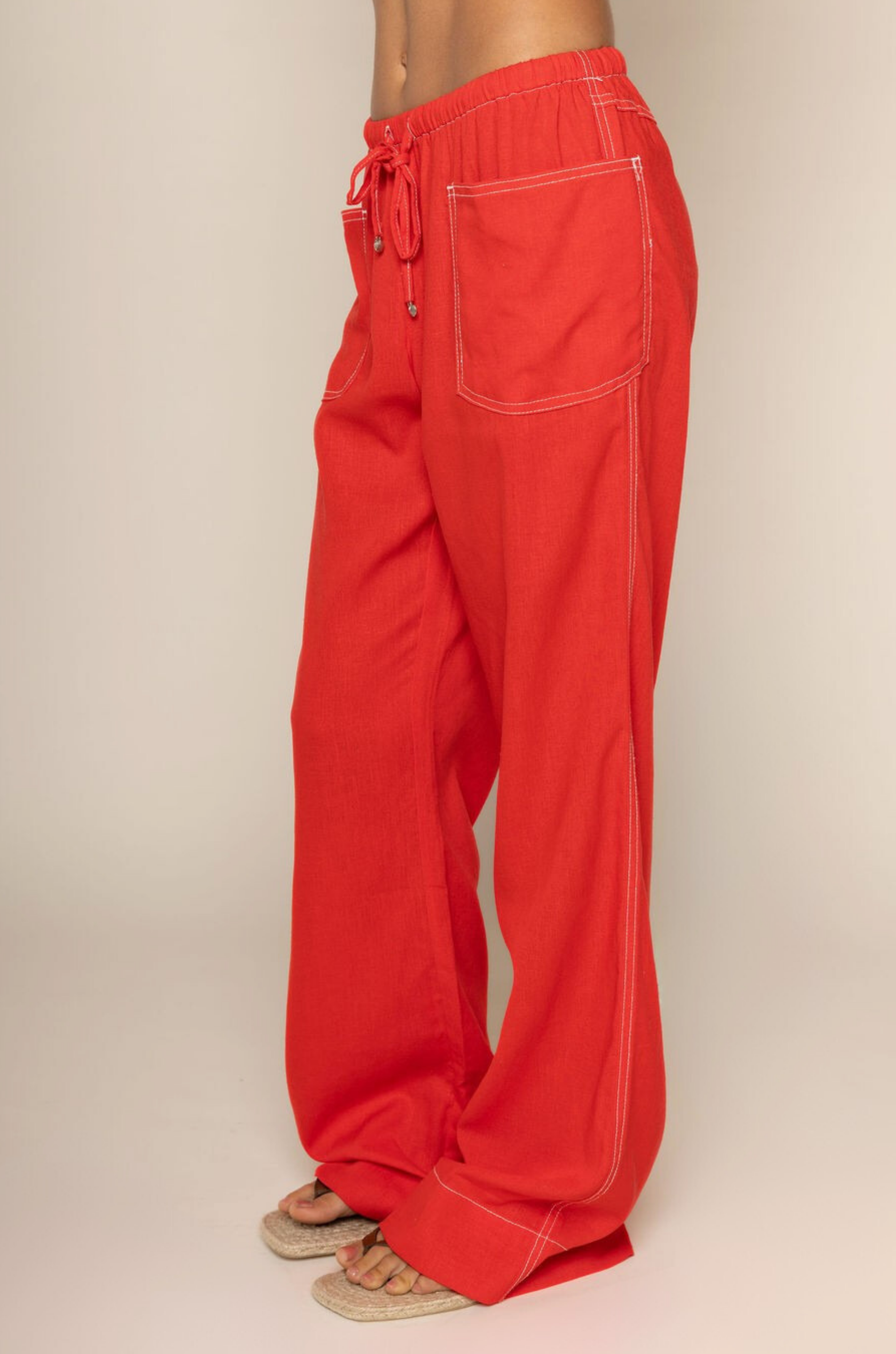 red Linen pants
Elastic adjustable drawstring waistband
White contrast stitching
2 front pockets
Unlined
red cover up pants
swim cover up
fourth of july swim cover up