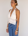 cream white Chiffon woven smocked halter top
Adjustable neck and back tie
Ruffle detail
Backless
Partially lined/sheer
bachelorette top outfit
going out top outfit
white tank top